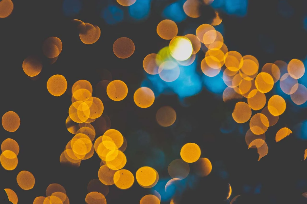 Hình nền bokeh ánh sáng vàng xanh lung linh